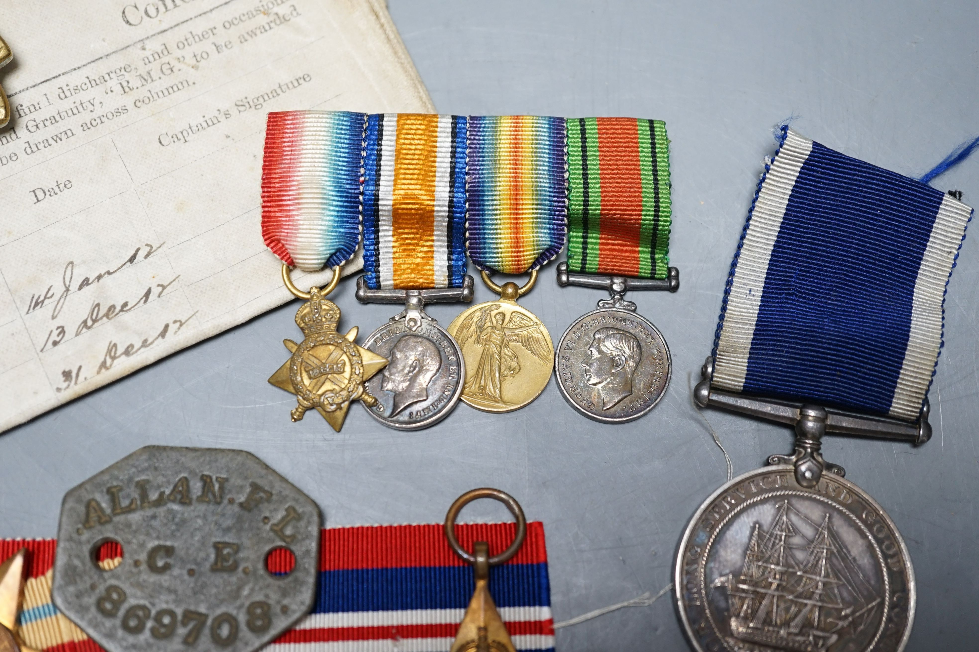 A WWI medal trio awarded to J. 11048 F. P. SHARMAN. A.B. R.N., a George V Royal Navy long service and good conduct medal awarded to M.38014 F. P. SHARMAN. R. P O. H.M.S. REPULSE, a WWI miniature dress medal group, a WWII